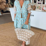 Mana | Midi-Kleid mit floralen Mustern und V-Ausschnitt