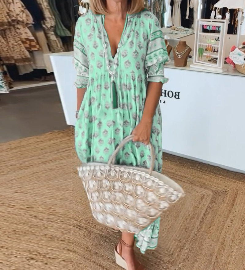 Mana | Midi-Kleid mit floralen Mustern und V-Ausschnitt