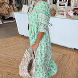 Mana | Midi-Kleid mit floralen Mustern und V-Ausschnitt